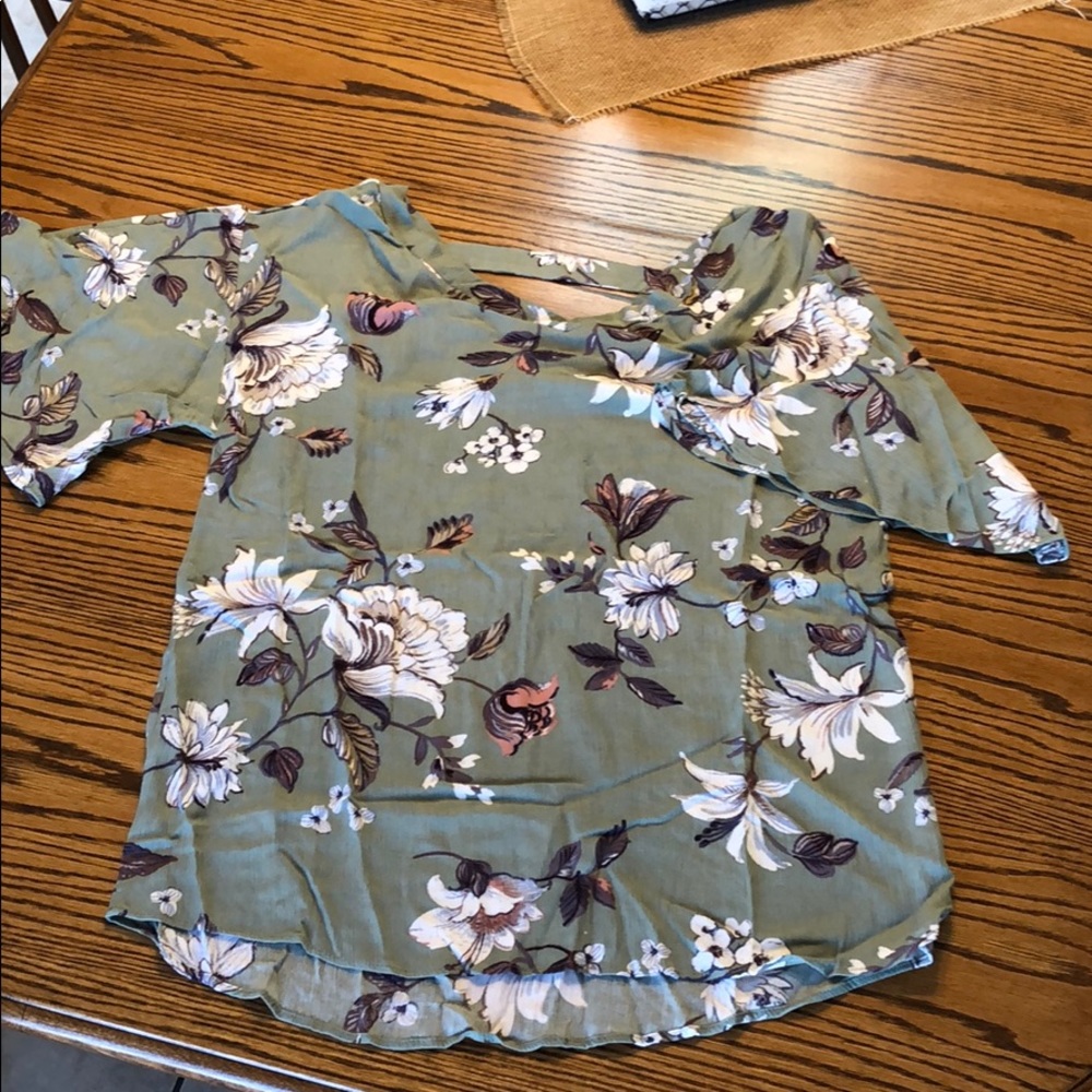 Green, light, airy top with flutter sleeve